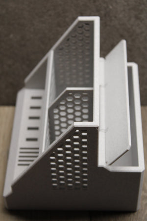 3D-printed desk caddy with hidden back compartment
