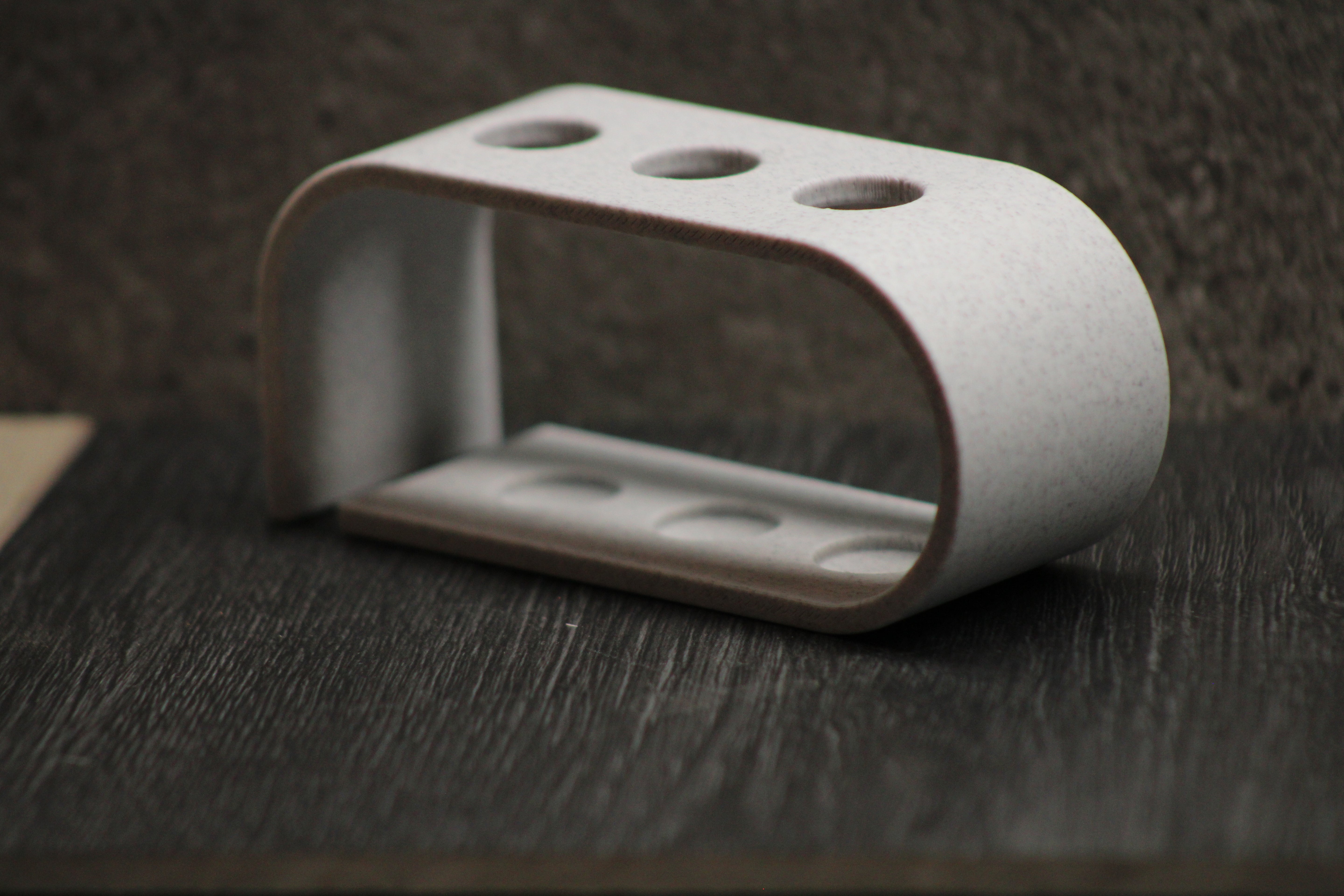 Modern 3D printed pen holder on desk