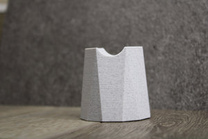 Marble-effect Apple Pencil pen stand on desk